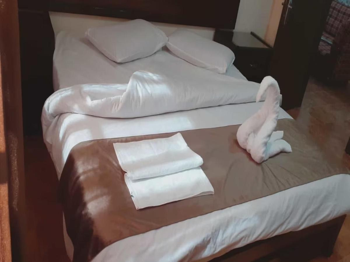 Al-Nujoom Hotel Suites Amman Extérieur photo